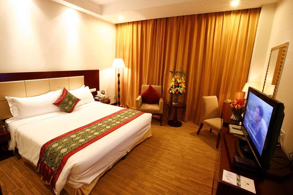 ג'ינאן Grand Metropark Hotel Shandong חדר תמונה